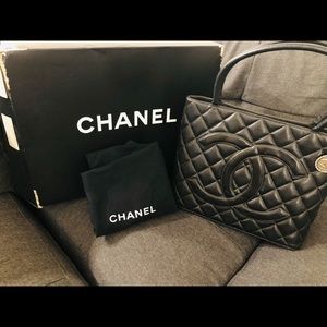 Authentic Chanel medallion tote black caviar skin